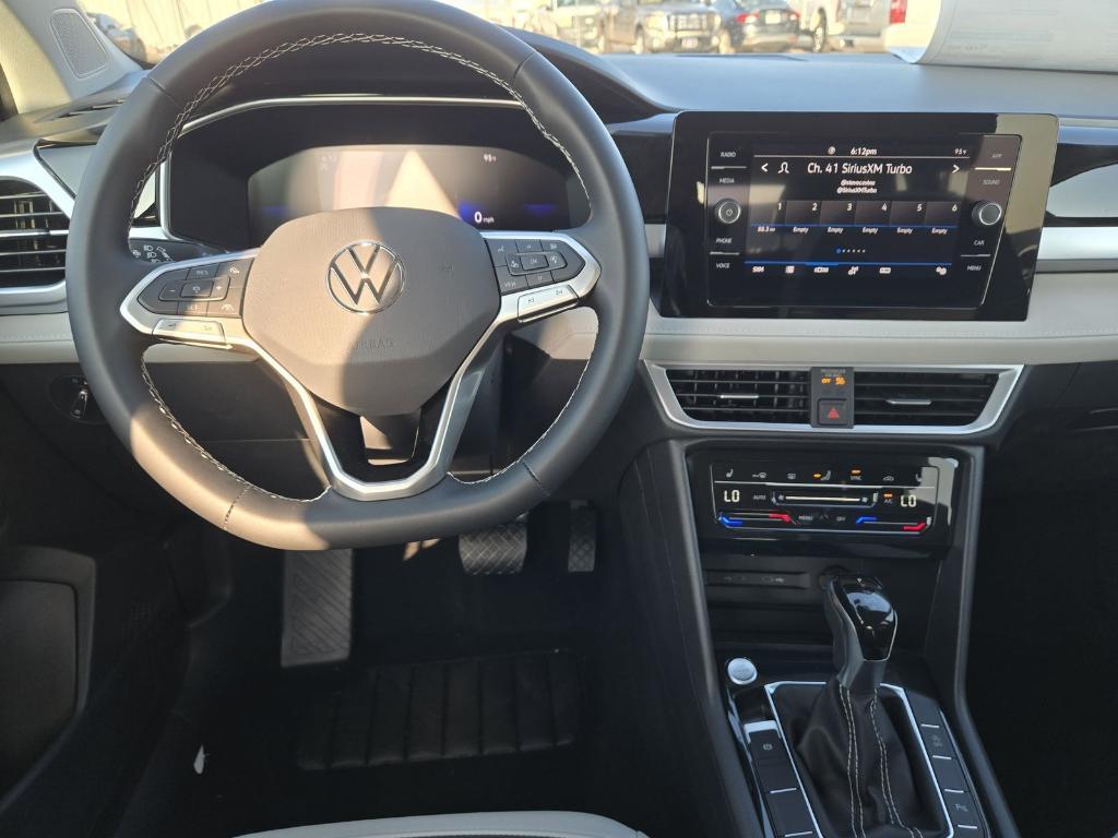 new 2025 Volkswagen Taos car, priced at $26,678