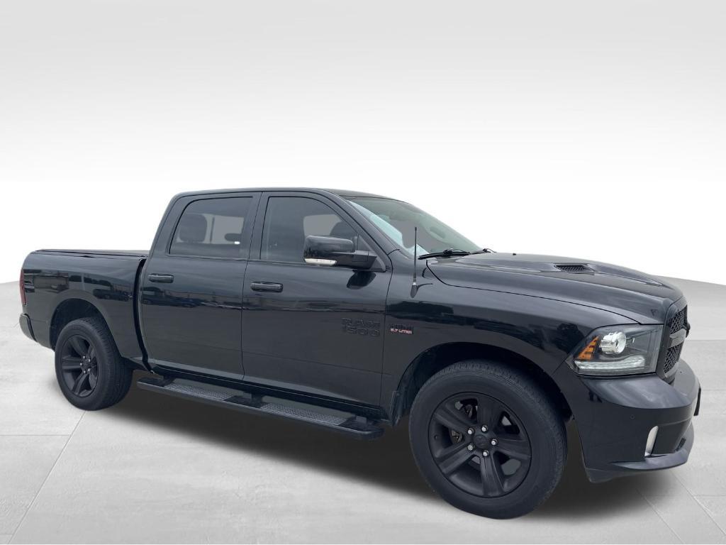 used 2018 Ram 1500 car, priced at $28,102