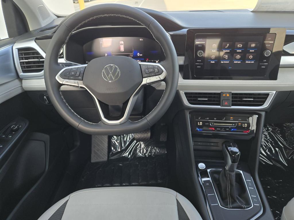 new 2025 Volkswagen Taos car, priced at $27,089