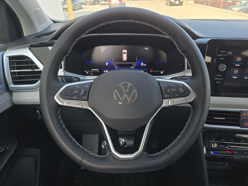 new 2025 Volkswagen Taos car, priced at $27,089