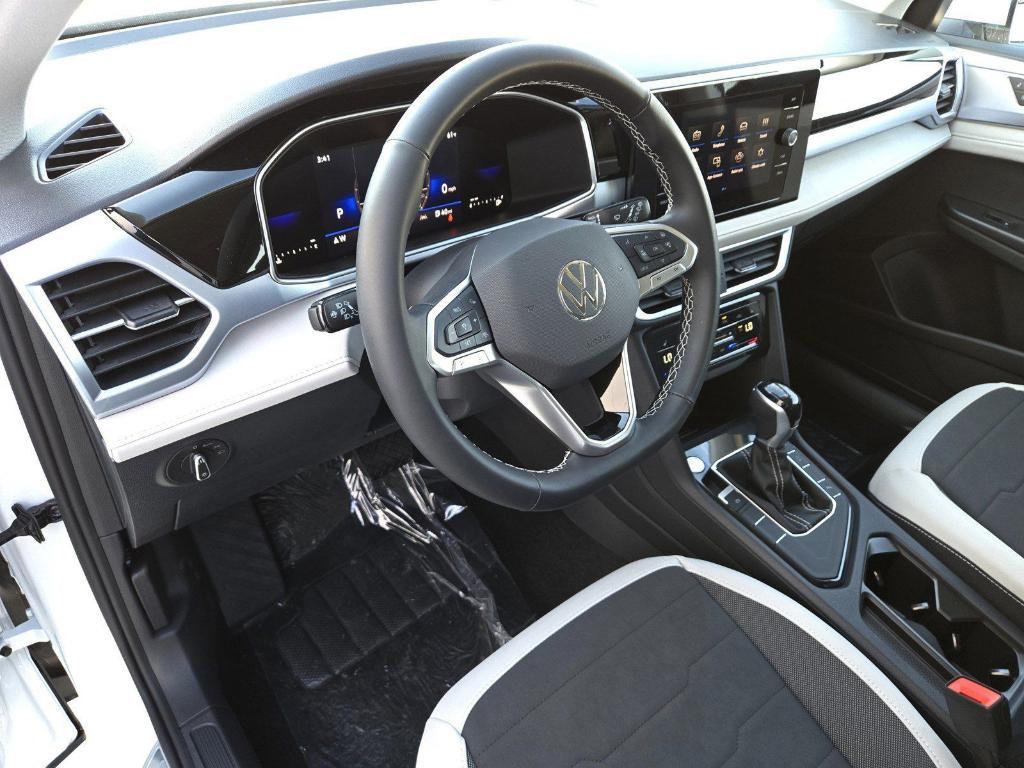 new 2025 Volkswagen Taos car, priced at $28,133