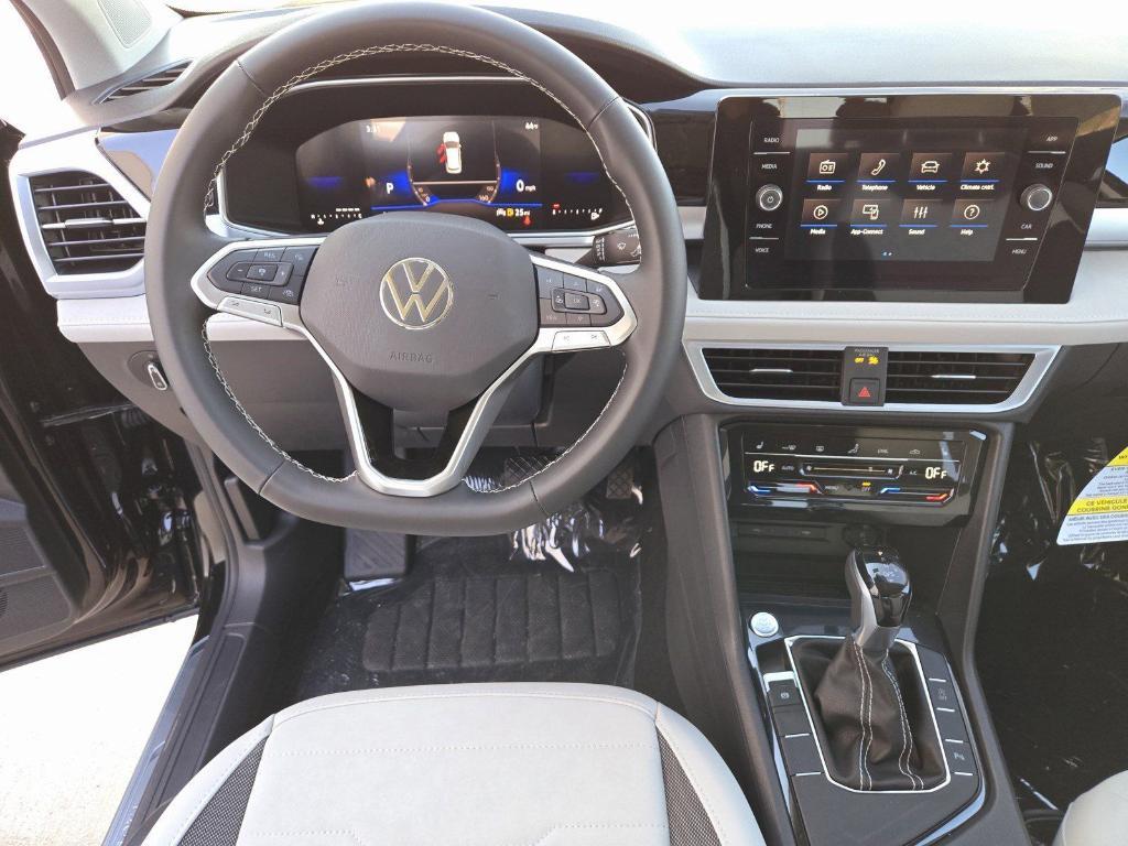 new 2025 Volkswagen Taos car, priced at $28,133