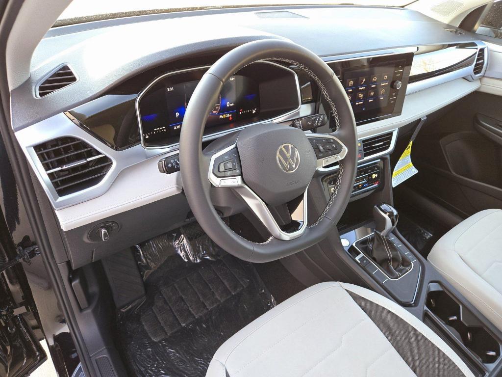 new 2025 Volkswagen Taos car, priced at $28,133