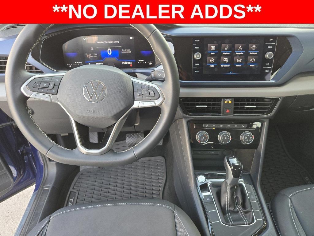 used 2023 Volkswagen Taos car, priced at $31,479