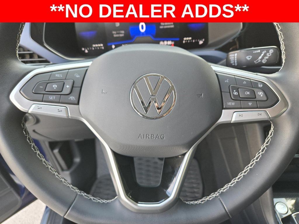 used 2023 Volkswagen Taos car, priced at $31,479