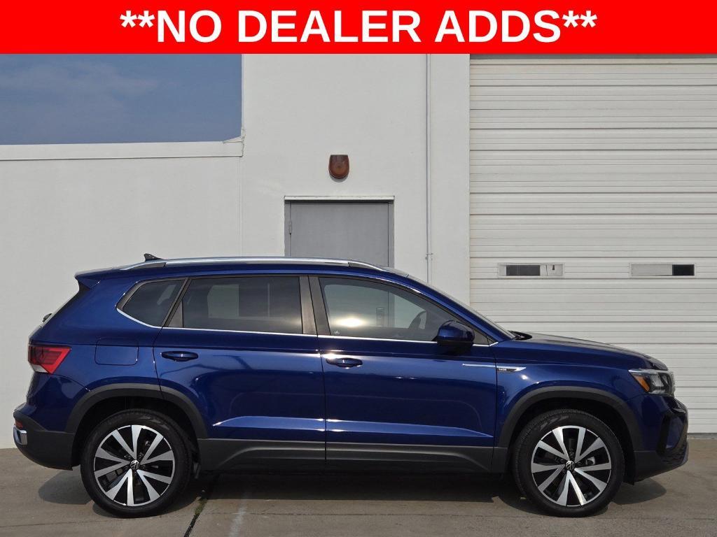 used 2023 Volkswagen Taos car, priced at $31,479