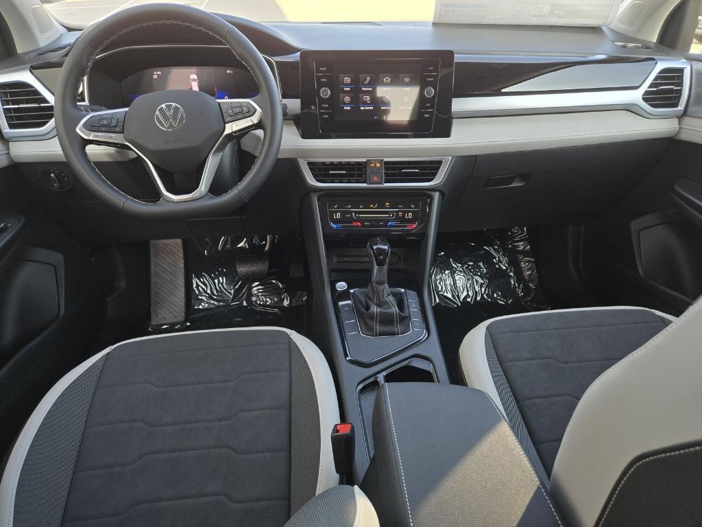 new 2025 Volkswagen Taos car, priced at $26,678