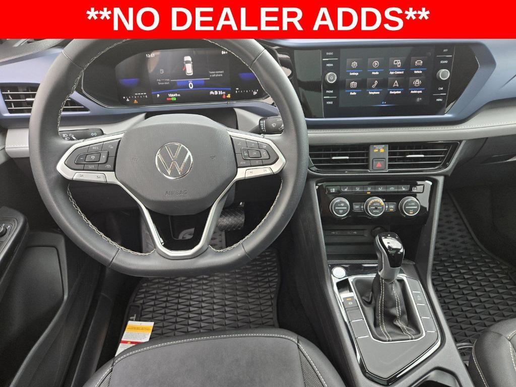 used 2024 Volkswagen Taos car, priced at $26,918