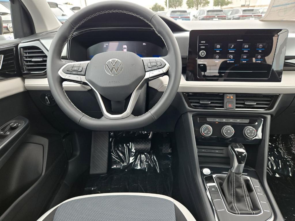 new 2025 Volkswagen Taos car, priced at $26,502