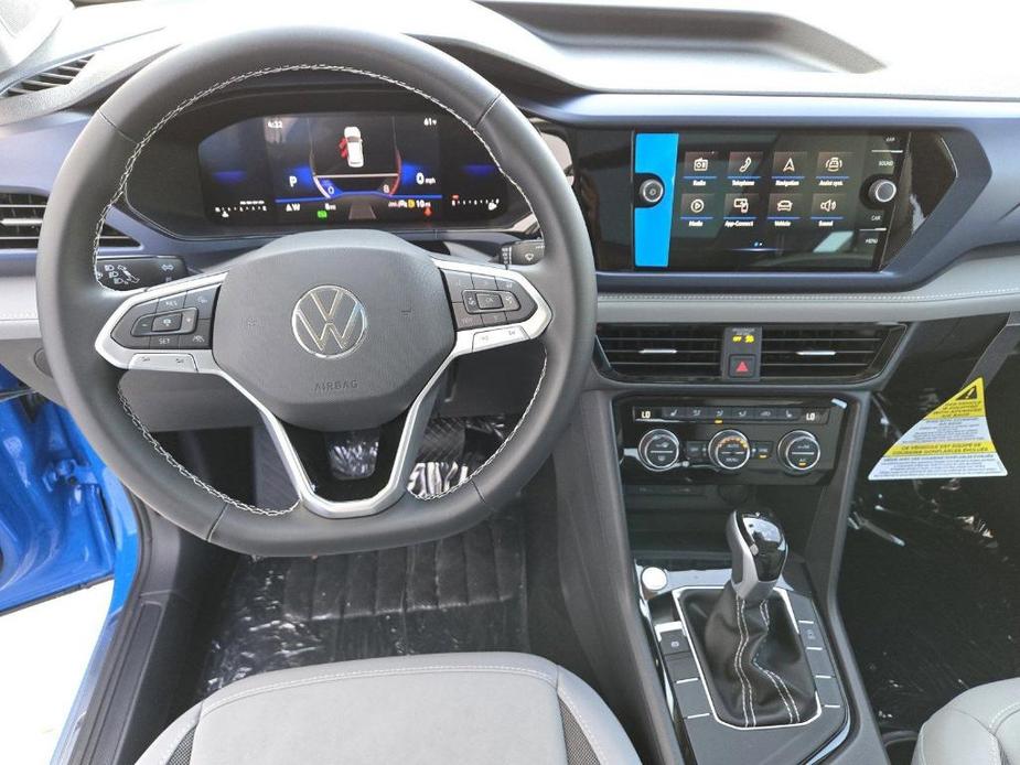 new 2024 Volkswagen Taos car, priced at $28,083