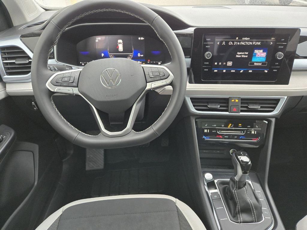 new 2025 Volkswagen Taos car, priced at $29,373