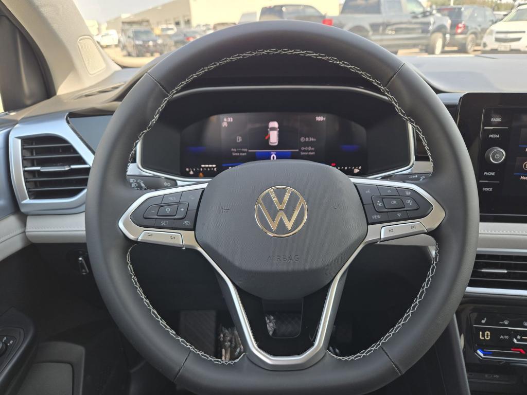 new 2025 Volkswagen Taos car, priced at $26,670