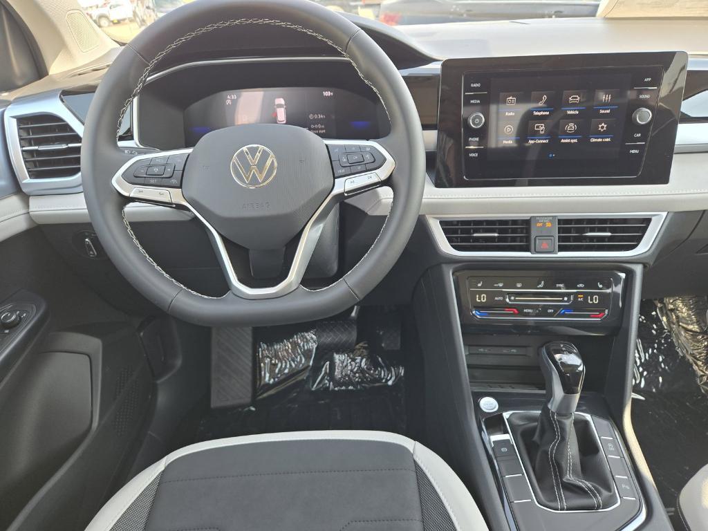 new 2025 Volkswagen Taos car, priced at $26,670