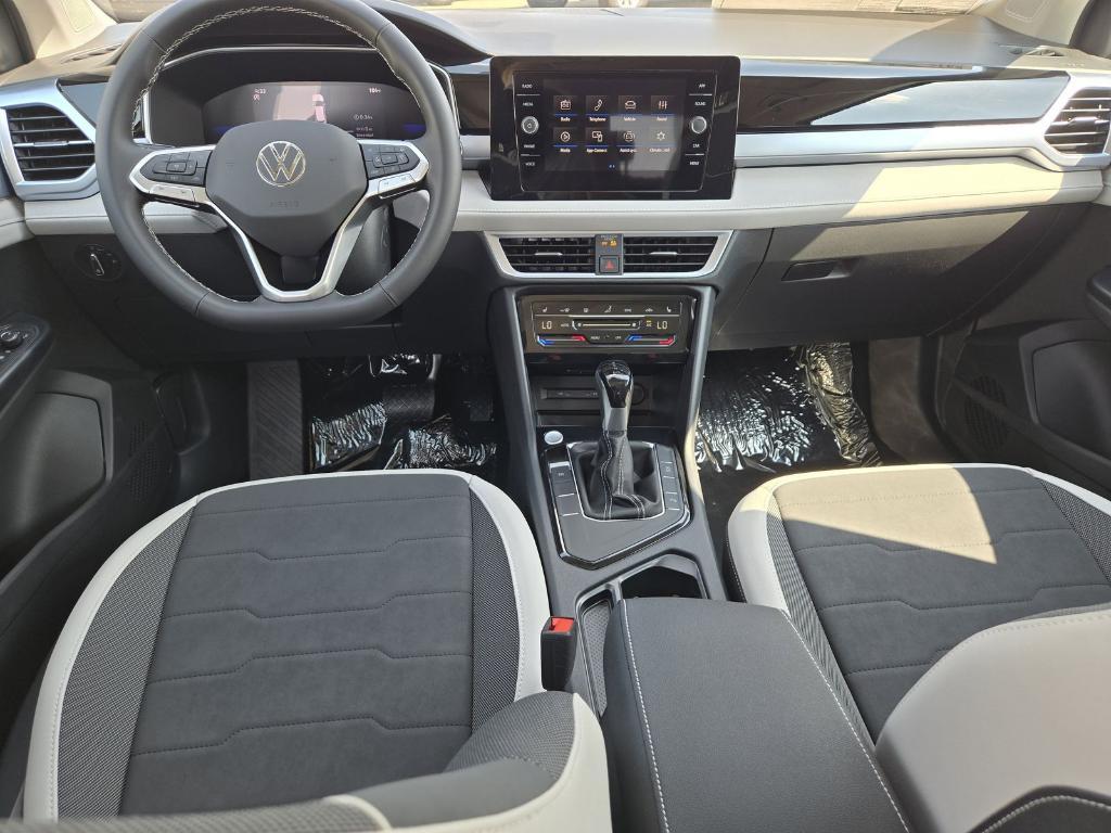 new 2025 Volkswagen Taos car, priced at $26,670