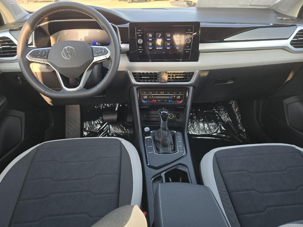 new 2025 Volkswagen Taos car, priced at $26,678