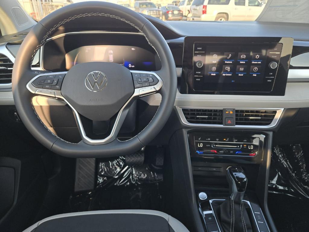 new 2025 Volkswagen Taos car, priced at $26,678