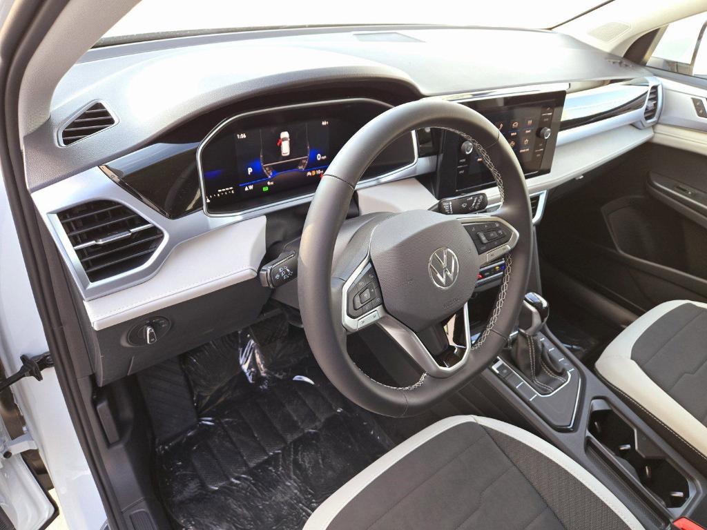 new 2025 Volkswagen Taos car, priced at $28,191