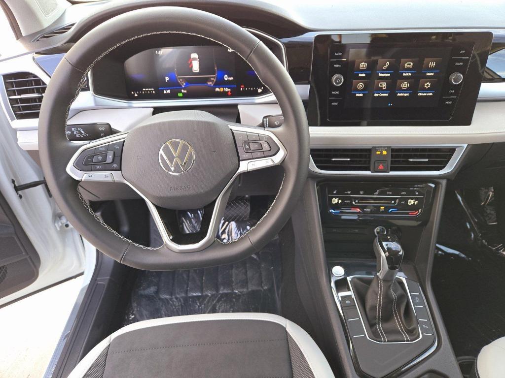 new 2025 Volkswagen Taos car, priced at $28,191