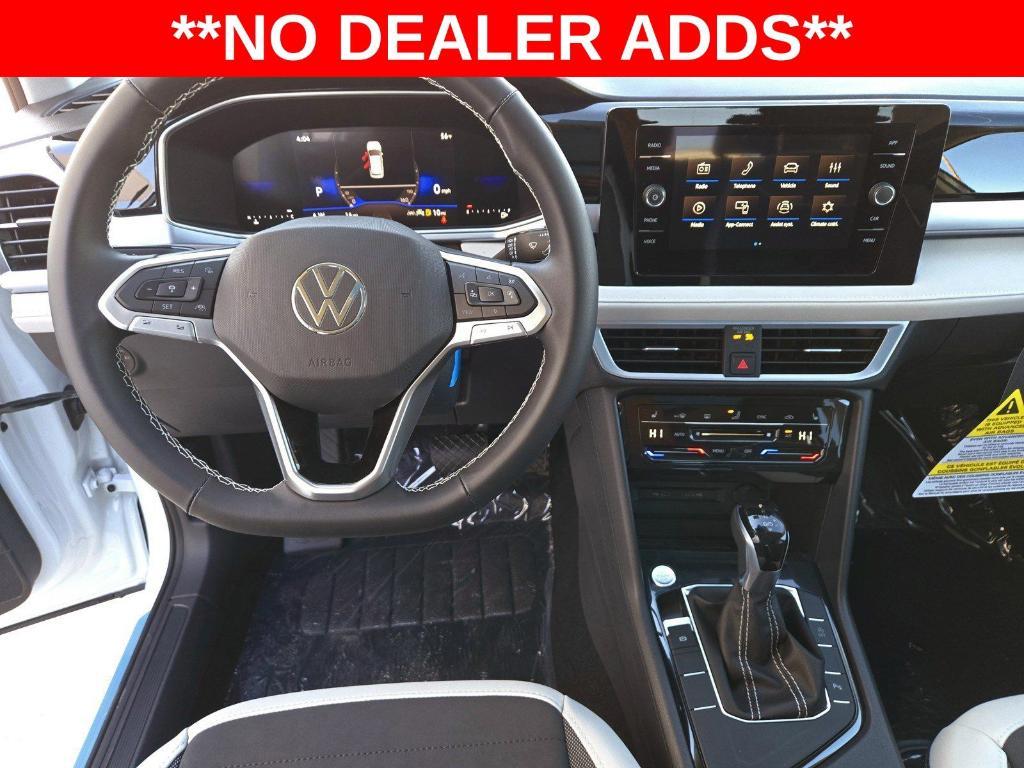 new 2025 Volkswagen Taos car, priced at $30,183