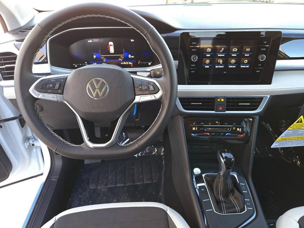 new 2025 Volkswagen Taos car, priced at $29,183