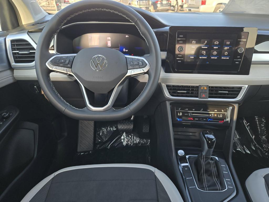 new 2025 Volkswagen Taos car, priced at $26,678