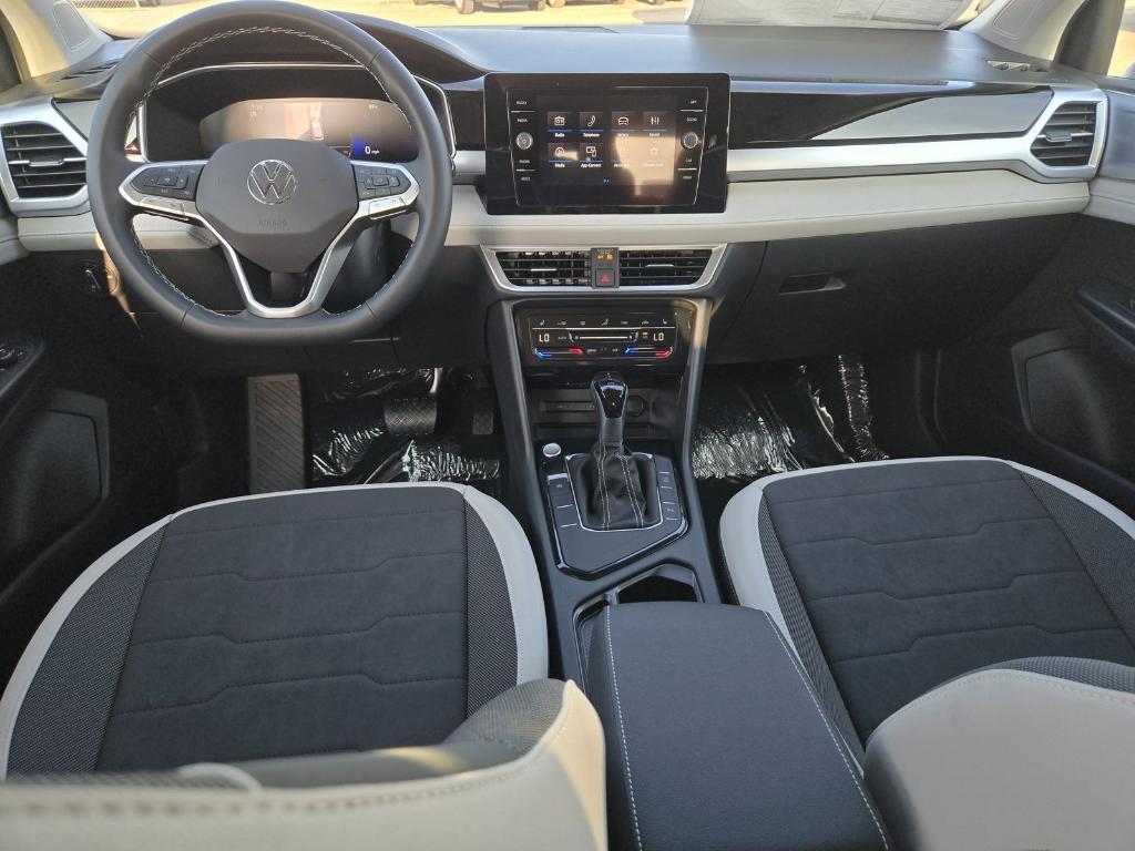 new 2025 Volkswagen Taos car, priced at $26,678