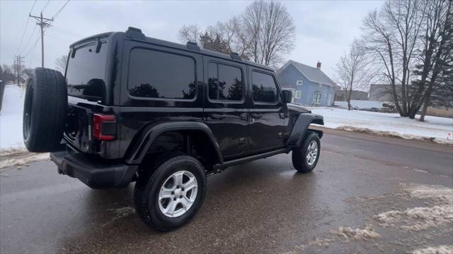 used 2021 Jeep Wrangler Unlimited car, priced at $33,940