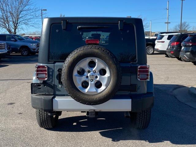 used 2014 Jeep Wrangler Unlimited car, priced at $17,093