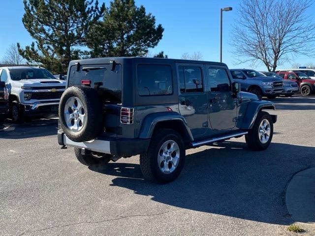 used 2014 Jeep Wrangler Unlimited car, priced at $17,093