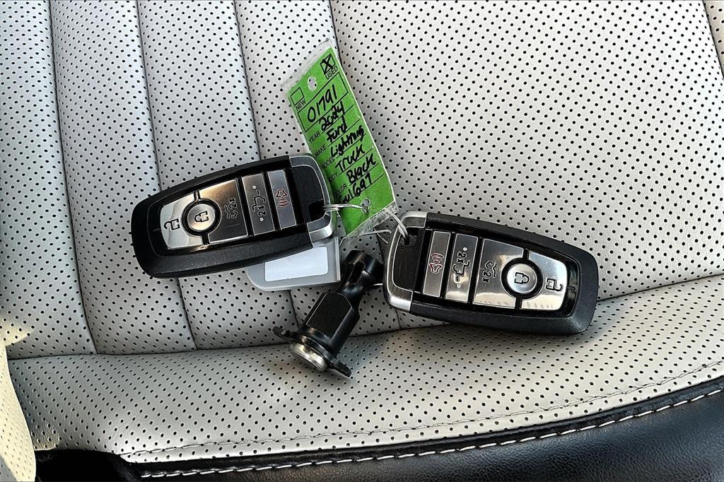 used 2024 Ford F-150 Lightning car, priced at $64,295