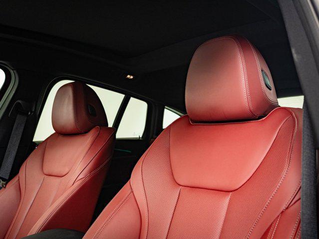 used 2025 BMW X4 car, priced at $53,998