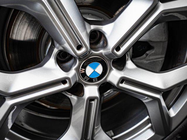 used 2025 BMW X4 car, priced at $53,998