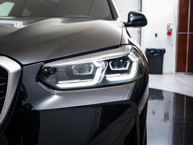 used 2025 BMW X4 car, priced at $53,998