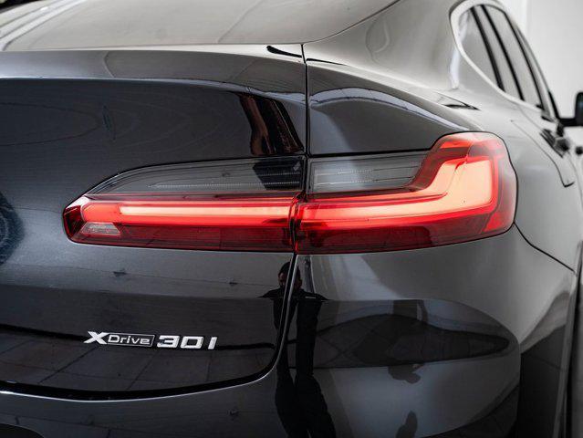 used 2025 BMW X4 car, priced at $53,998