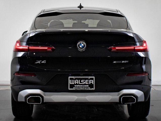 used 2025 BMW X4 car, priced at $53,998