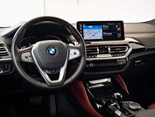 used 2025 BMW X4 car, priced at $53,998