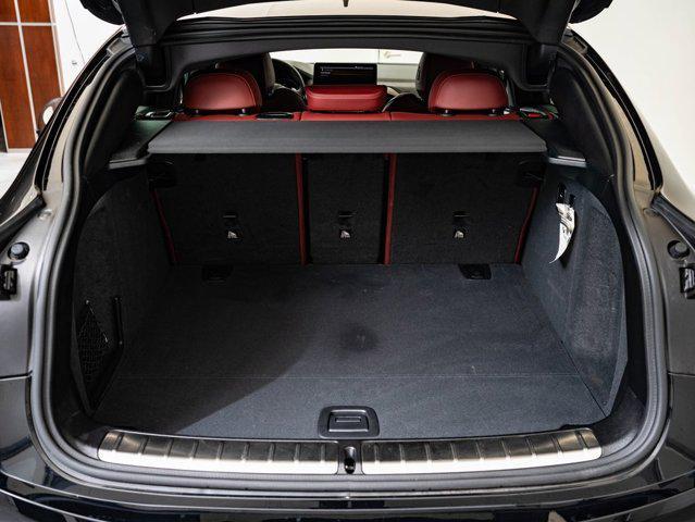 used 2025 BMW X4 car, priced at $53,998