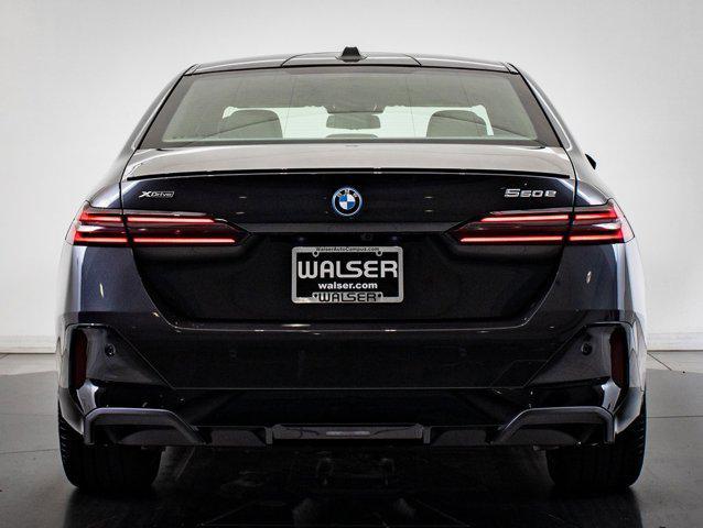 new 2026 BMW 550e car, priced at $85,860