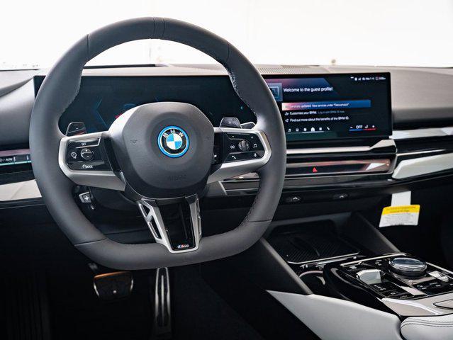 new 2026 BMW 550e car, priced at $85,860