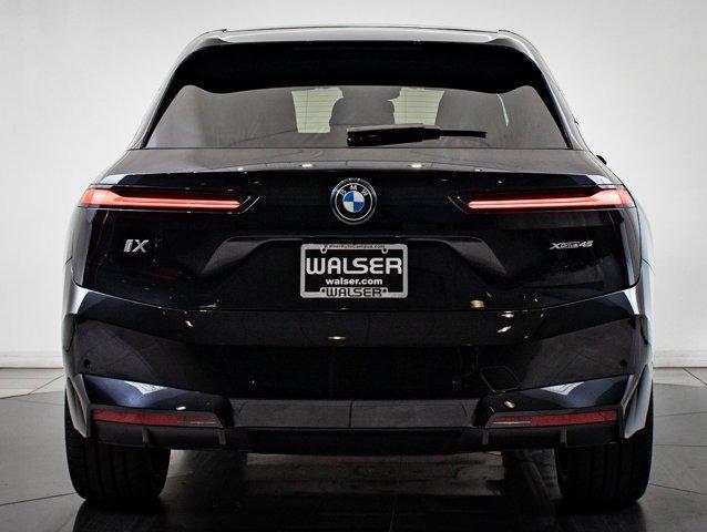 new 2026 BMW iX car, priced at $88,295