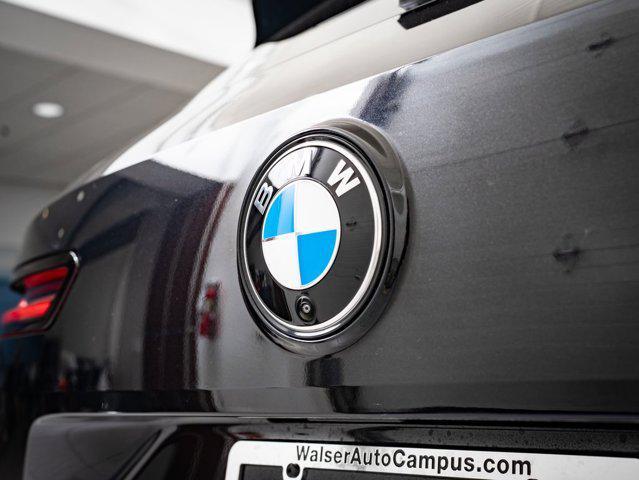 new 2026 BMW iX car, priced at $88,295