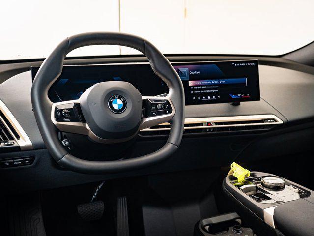 new 2026 BMW iX car, priced at $88,295
