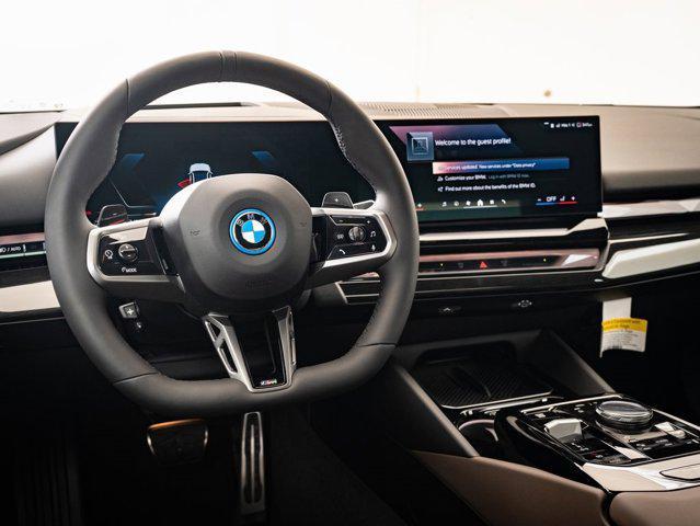 new 2026 BMW 550e car, priced at $83,460