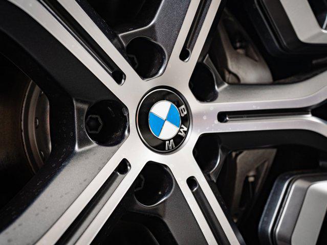 new 2026 BMW iX car, priced at $98,545