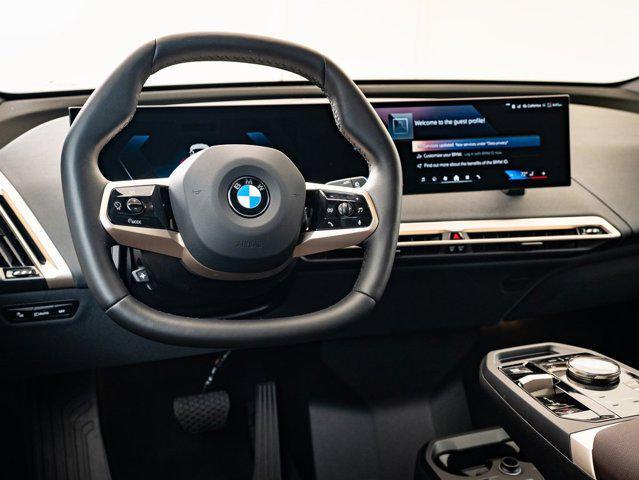 new 2026 BMW iX car, priced at $98,545