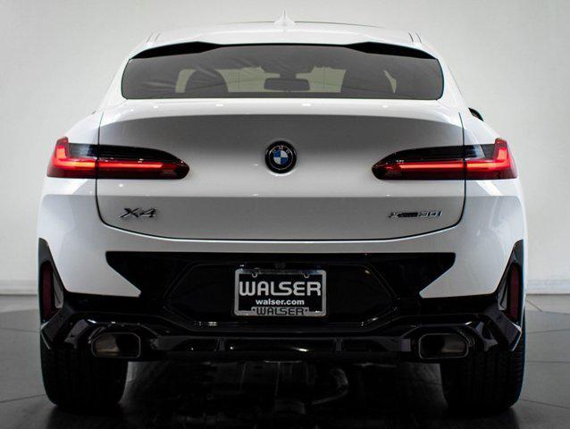 new 2025 BMW X4 car, priced at $63,420
