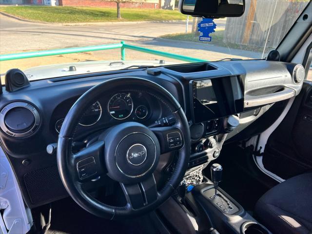 used 2014 Jeep Wrangler Unlimited car, priced at $15,999