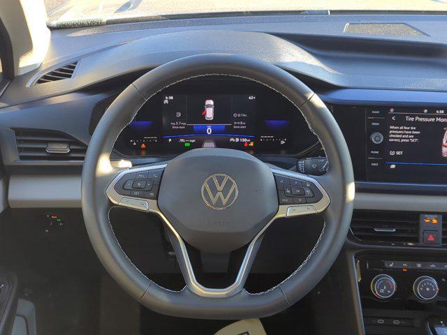 used 2023 Volkswagen Taos car, priced at $22,999