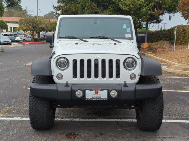 used 2015 Jeep Wrangler Unlimited car, priced at $25,999