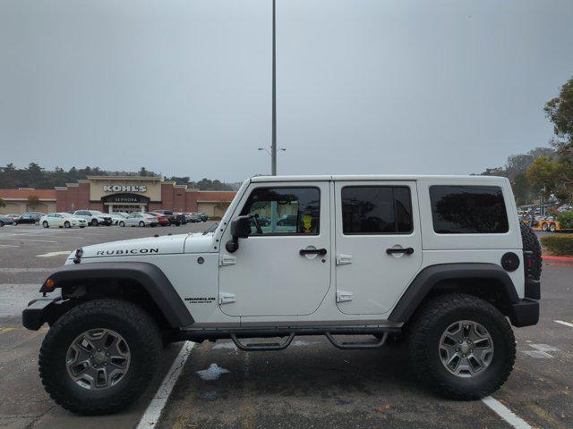 used 2015 Jeep Wrangler Unlimited car, priced at $25,999